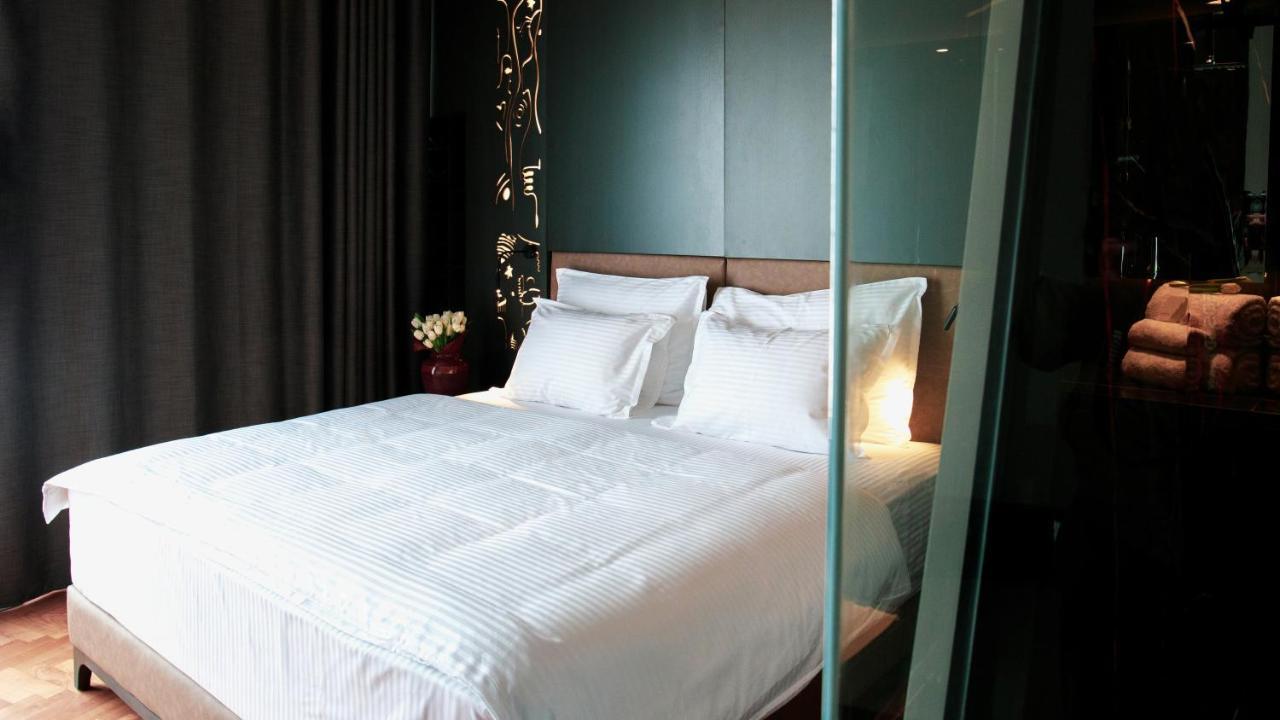Arka Art Hotel Kashar Екстер'єр фото A bed with white sheets